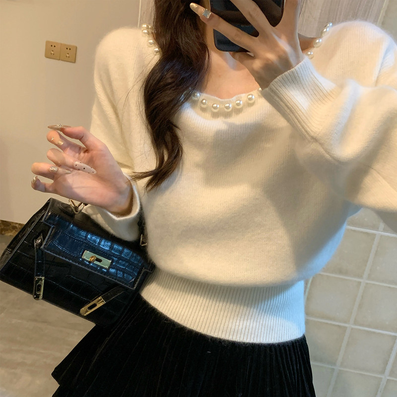 Autumn and winter soft beaded off-shoulder white sweater for women, stylish and elegant knit top Autumn and winter soft beaded off-shoulder white sweater for women, stylish and elegant knit top