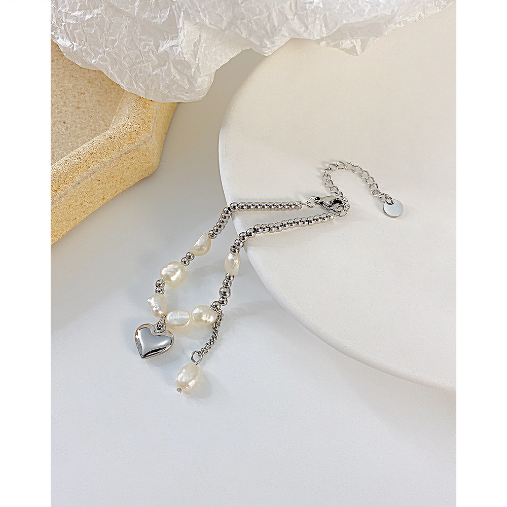 Nouveau Bracelet En Acier Inoxydable Avec Perles D&#39;eau Douce Et Coutures De Coeurs De Pêche Rétro En Gros display picture 2