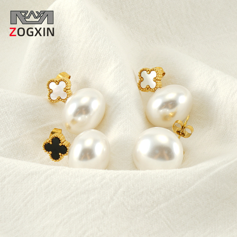 Amazon nuevo trébol de cuatro hojas pendientes luz moda de lujo simple elegante perla pendientes de acero de titanio en stock al por mayor