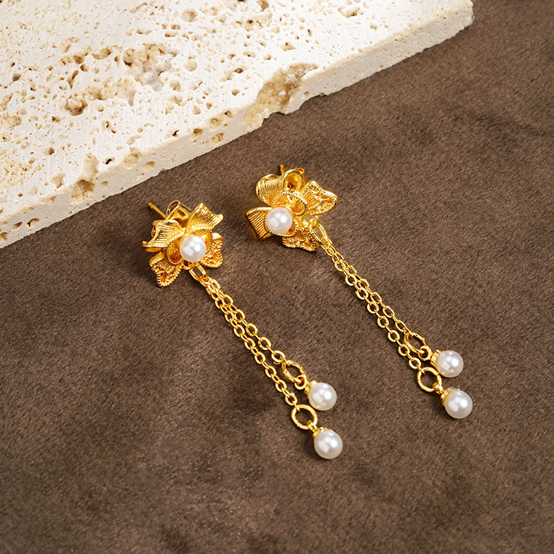 Nuevos pendientes de oro de arena vietnamita de estilo étnico, pendientes de borla de perlas de imitación de lazo, joyería de alta gama de lujo ligero femenino