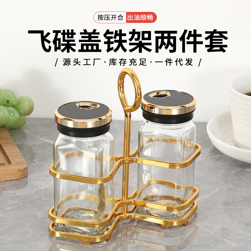 Tarro de condimento de vidrio transparente al por mayor, suministros de cocina, tarro de condimento de sal MSG, juego de botella de condimento creativo de lujo ligero para el hogar