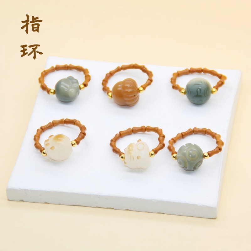 菩提萌宠竹节橄榄核小戒指炭烧小猫爪弹力指环竹节古风小饰品批发