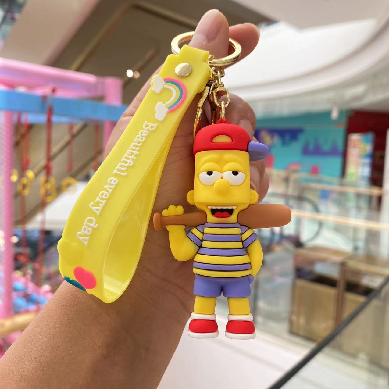 Cross-border Simpson llavero de dibujos animados muñeca pareja bolsa Coche colgante muñeca máquina muñeca pequeño regalo al por mayor