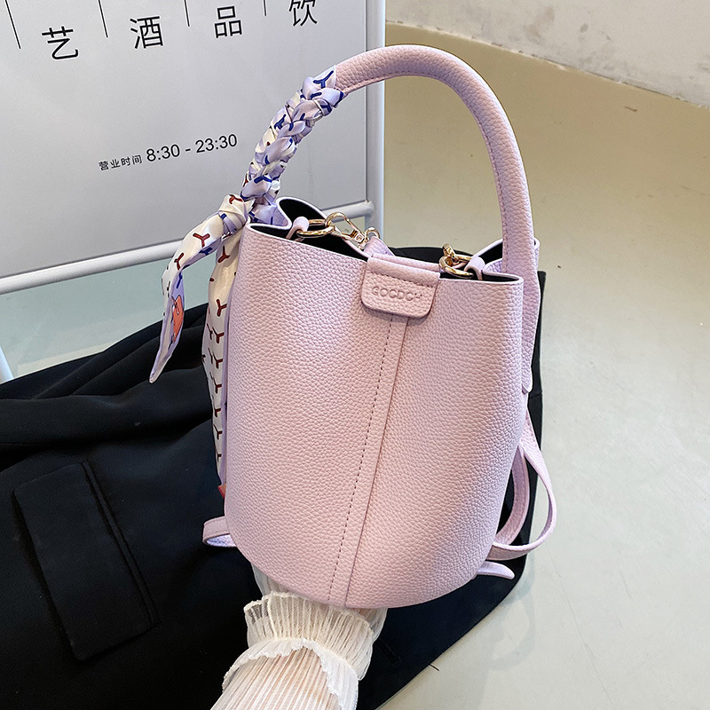 Bolso de cubo de mano de estilo explosivo transfronterizo 2025 nuevo bolso de hombro de tendencia simple popular bolso de mensajero de alta gama súper caliente