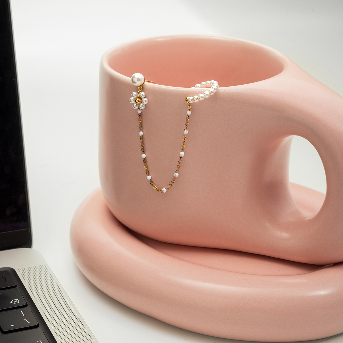 Wanxing flores de perlas europeas y estadounidenses líneas galvanizadas hueco auriculares de acero inoxidable transfronterizos versátiles no decolor auriculares