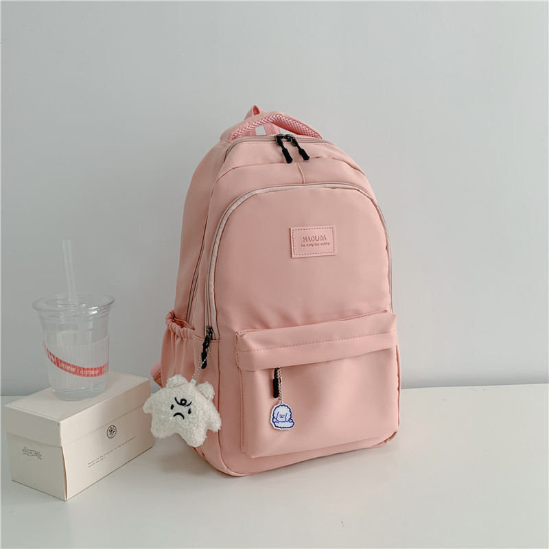 Mochila de las mujeres nuevo nylon color sólido estudiante de la escuela secundaria mochila de gran capacidad simple todo-fósforo estudiante universitario mochila impermeable