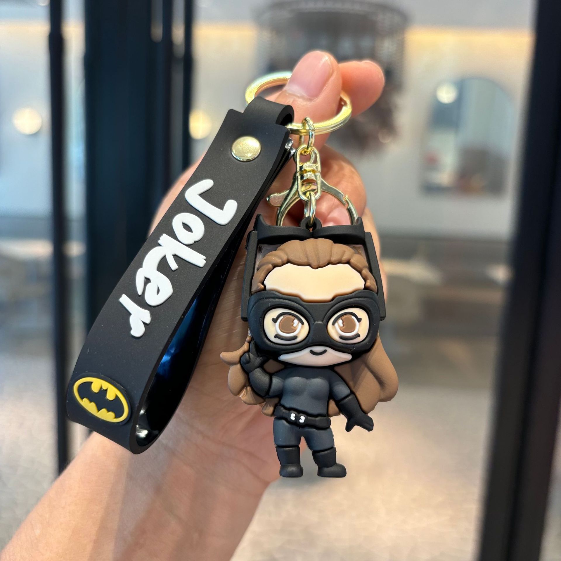 Batman cruzado superhéroes clown muñeca coche llavero colgante muñeca máquina de regalo pequeño