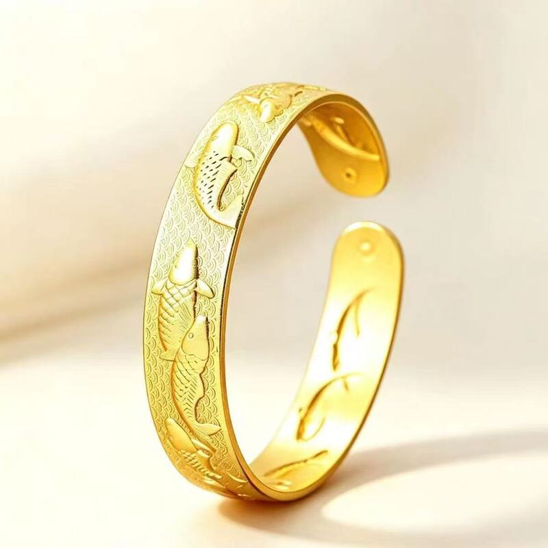 New Chinese-style embossed gold-colored open bangle with koi fish design, auspicious double fish wealth bracelet for middle-aged and elderly mothers, wedding gift New Chinese-style embossed gold-colored open bangle with koi fish design, auspicious double fish wealth bracelet for middle-aged and elderly mothers, wedding gift