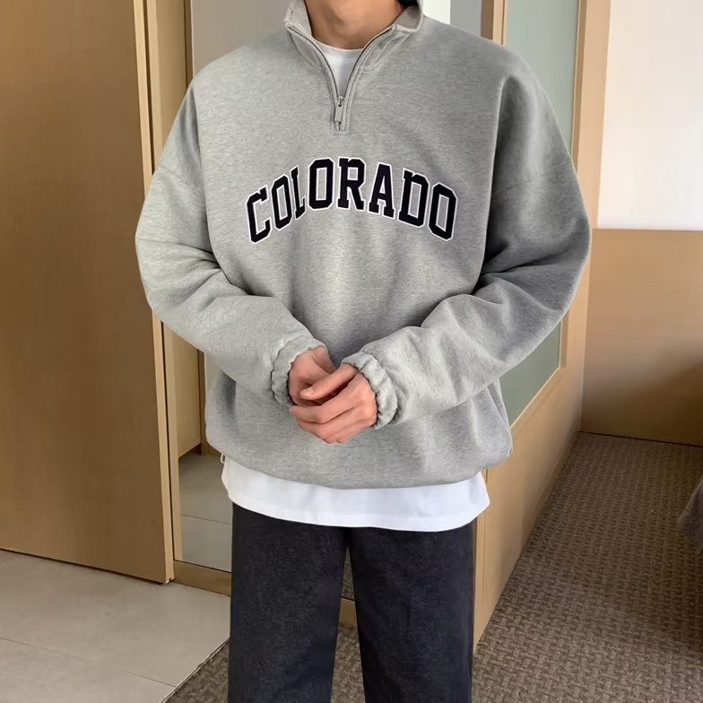 Semi-cremallera chaqueta de estilo de moda masculina estilo de estilo de moda letras impresión chaqueta coreana suelta chaqueta de primavera y otoño de manga larga