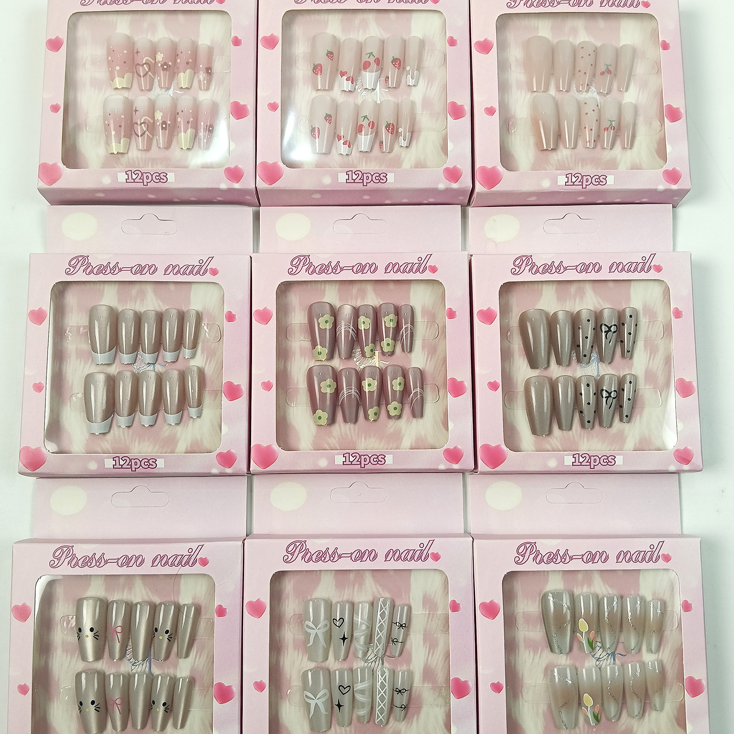 Explosiones transfronterizas escalera ojo de gato fábrica al por mayor 12 piezas de uñas falsas productos terminados estudiantes de estilo simple