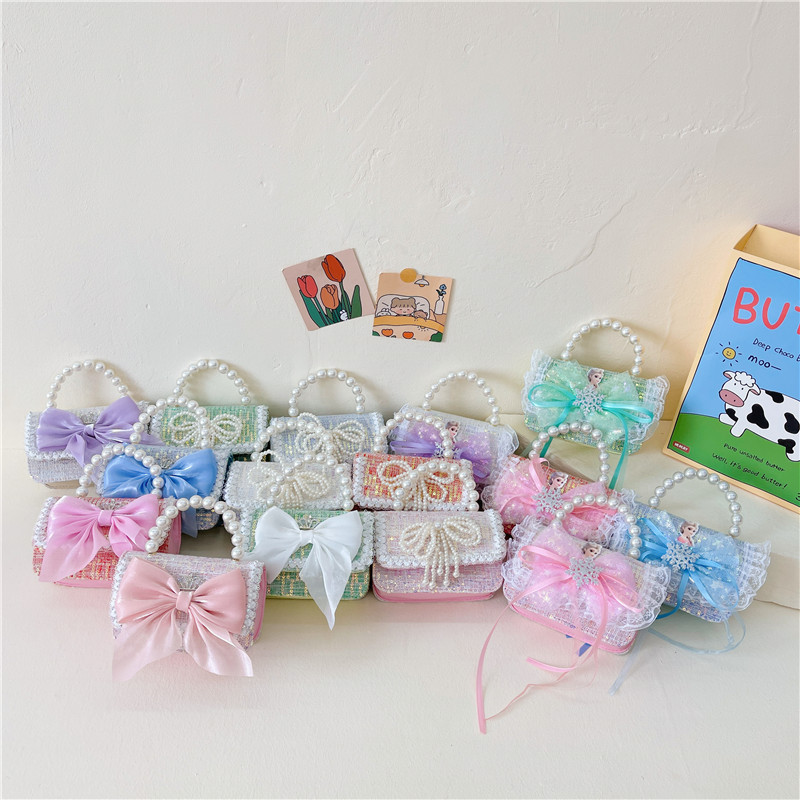 Baja de arco para niños ropa para niños bolsas lindas bolsas de cambio 2024 nuevo pañuelo de cáscara dura bolsas de tramo inclinadas bolsas de princesa de niñas