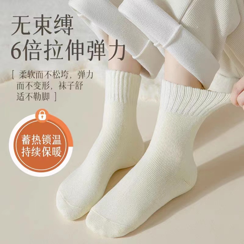 保温靴下の子供の秋冬タイプの中筒靴下にベルベットの厚い雪の長い筒月子靴下の床の超厚いストッキング