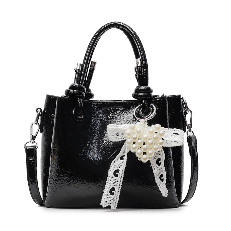 Bolso de mano de tendencia de comercio exterior femenino 2025 nuevo estilo plisado todo-fósforo bolso de hombro retro de alta gama ocio cubo bolso