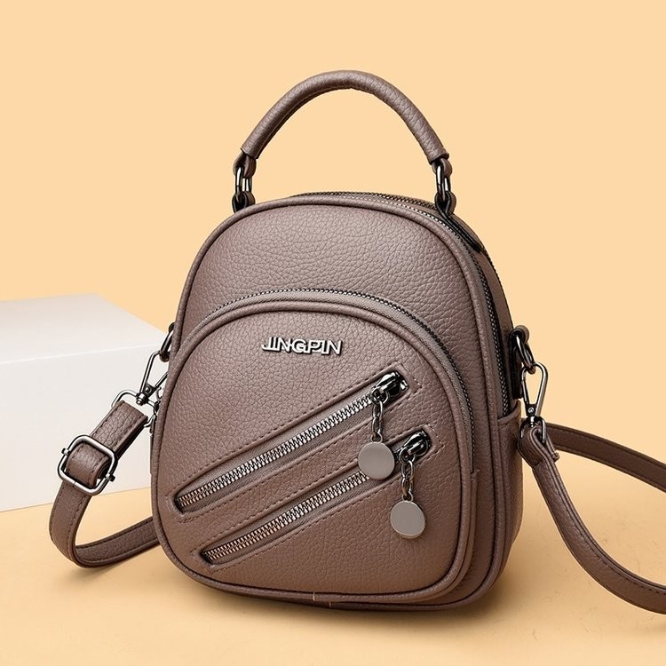 2026 textura transfronteriza mochila de cuero suave para chicas moda damas regalos prácticos bolsos de alta calidad de color sólido
