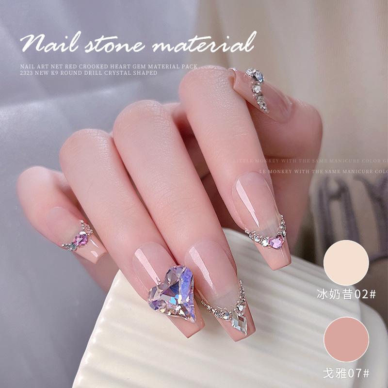 Arte de uñas celebridad en línea corazón torcido gema material paquete nuevo K9 cristal de diamante redondo tamaño especial en forma de diamante decoraciones de uñas al por mayor