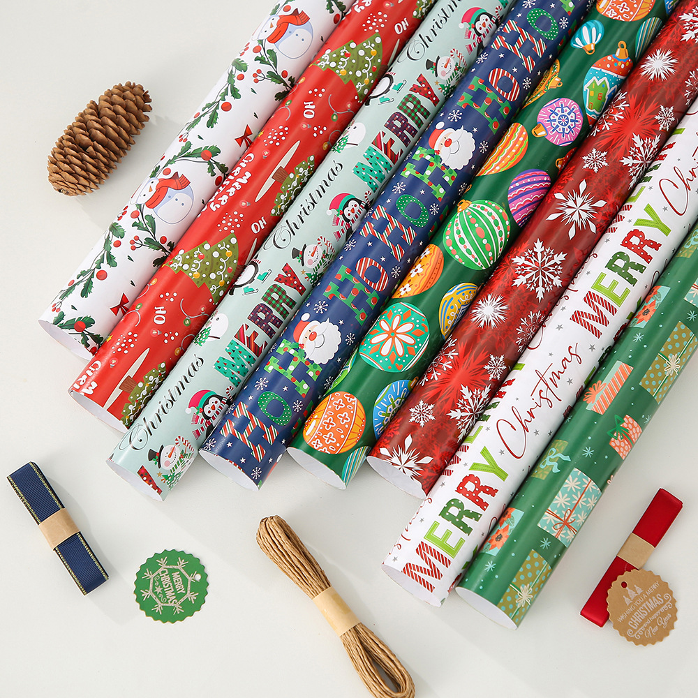 Nuevo papel de embalaje de papel de bronce de Navidad Papá Noel dibujos animados copo de nieve alce impresión de regalo embalaje de regalo