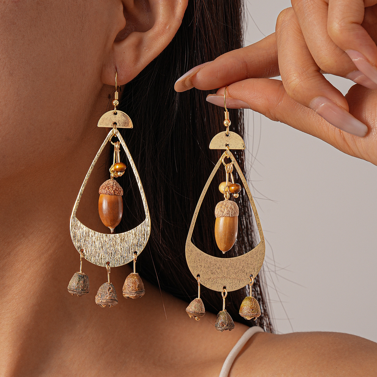 Europa y América retro núcleo de fruta geométrico agujero goteo bordilla gancho de orejas personalidad bohemia nicho de alta sensación pendientes para mujeres