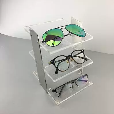 High-end transparent acrylic glasses, stand stainless steel, storage system solar-powered, sunglasses