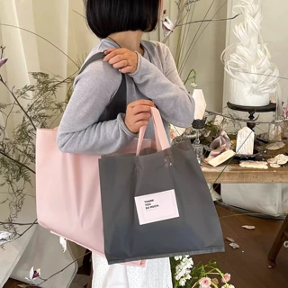 高级服装店手提袋磨砂塑料购物包装带衣服礼品打包用袋子现货批发