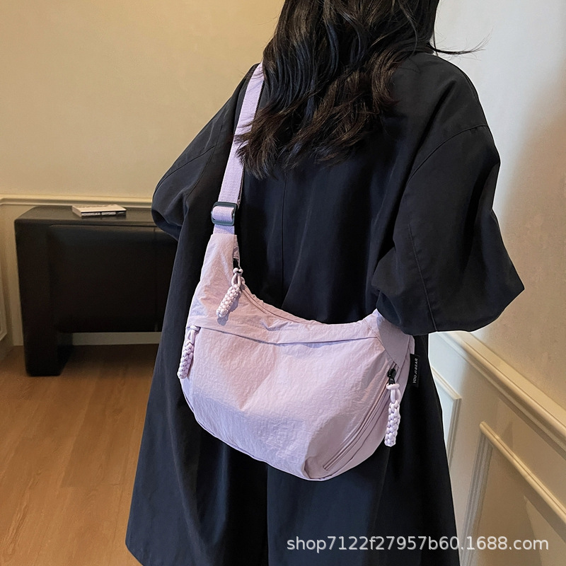 柚佐轻薄防水斜挎包女2025新款时尚单肩包大容量斜挎通勤饺子包爆|undefined