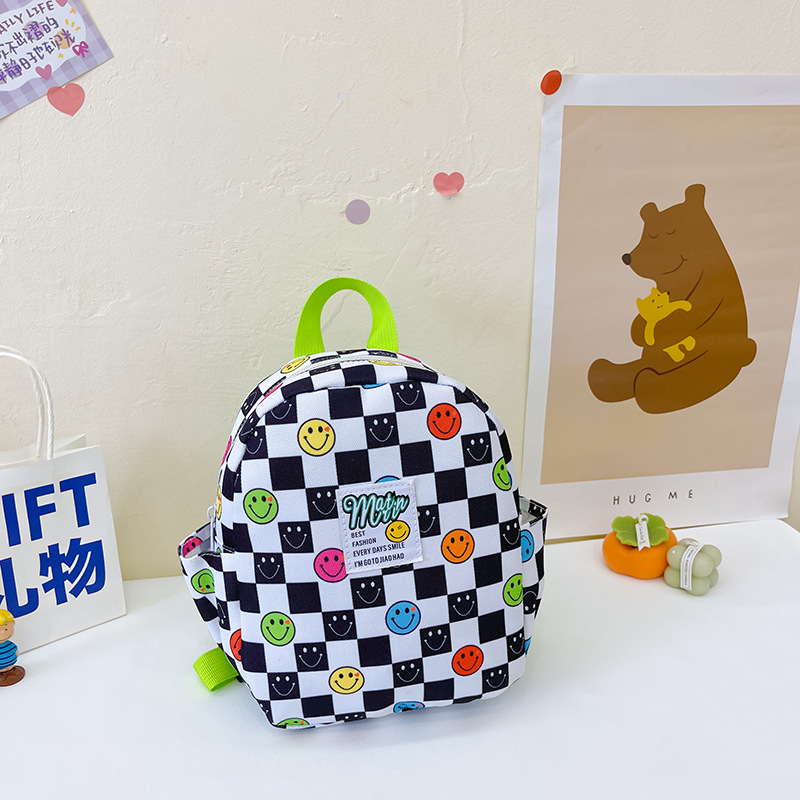 Mochila de color caramelo para niños 2022 nueva mochila de niño casual todo partido niños y niñas lindos mochila anti-Perdida