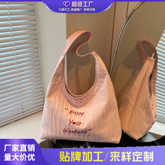 外国貿易の夏の大容量の刺繍のキャンバスのカバンの女性2025通勤のリュックサックのたるみ感のあるファッションの手提げのトートバッグ