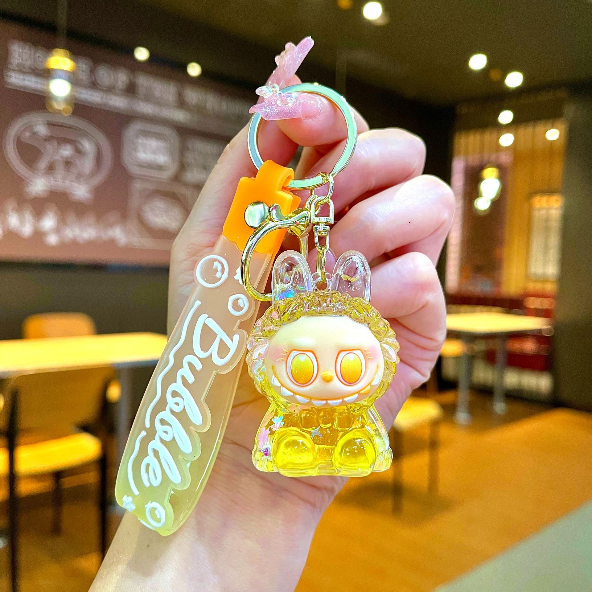 Llavero red acrílico con arena flotante