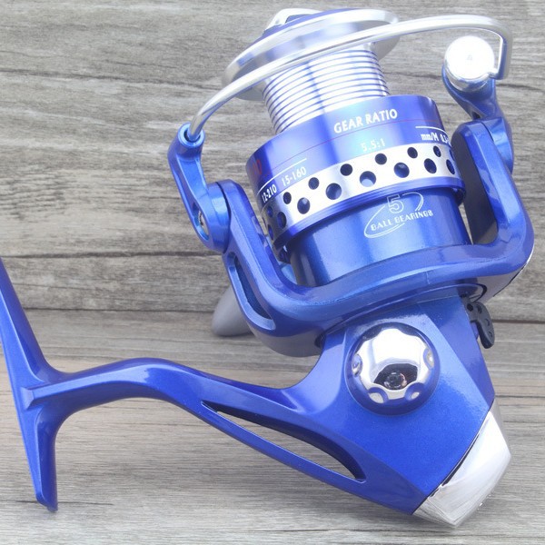 Suministro al por mayor pequeño carrete de pesca 200 tipo de plástico roca caña de pescar rueda giratoria multi-color opcional equipo de pesca caña de pescar carrete de pesca