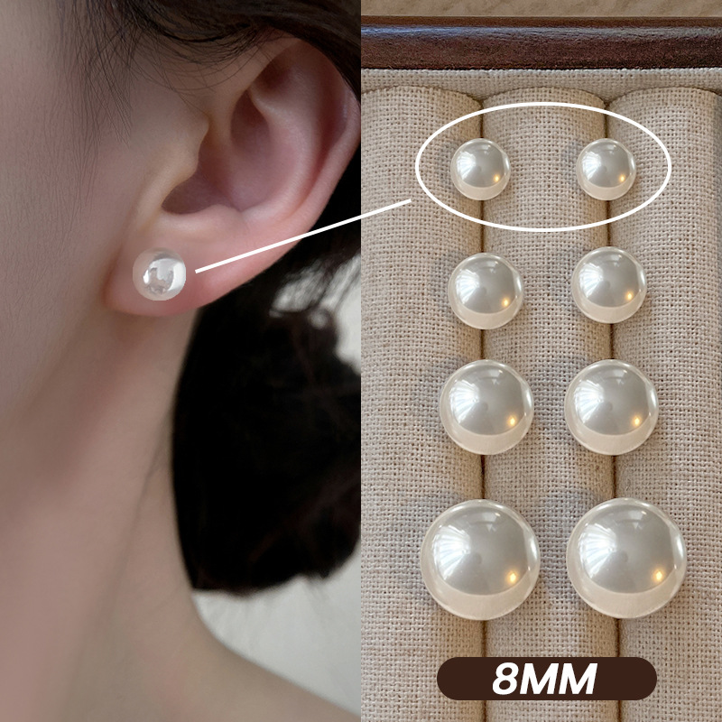 高級な真似のバロックは真珠のイヤリングをまねます。