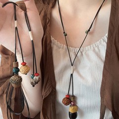 榛果陶磁器の長いペンダントのネックレスの女性の新しい中国式の復古の民族の風の毛の服のチェーンの小さい大衆の高級感のアクセサリー