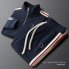 新しいファッションのサイドストライプのカジュアルなスポーツの服のスーツの男性の春秋のニットの男性の衛のズボンの2つのセットの潮の夢の偉さ