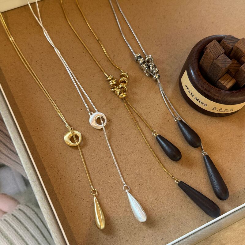 Matte Silver Brushed Water Drop Necklace for Women 2025 New Style Simple Niche Design Long Pullable Fashion Accessory Matte Silver Brushed Water Drop Necklace for Women 2025 New Style Simple Niche Design Long Pullable Fashion Accessory