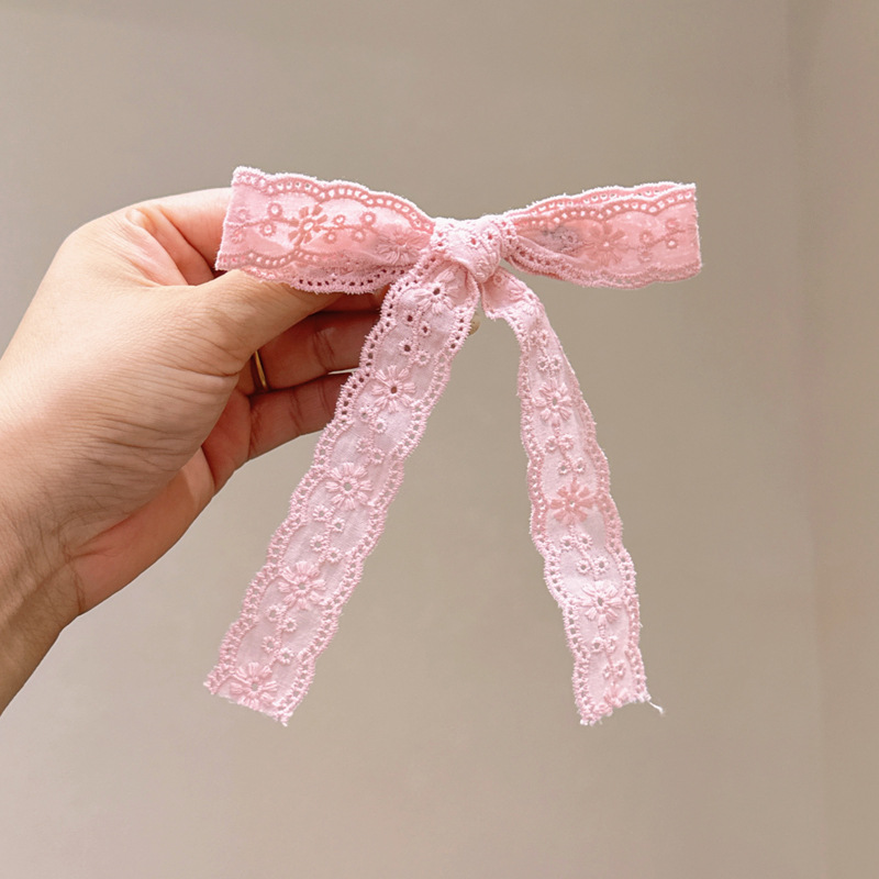 Розовая заколка для волос с бантиком