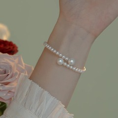 ガラス真珠のフランス式の優しさの気質のブレスレットの開口部のブレスレットの小さい衆の贈り物のワイヤーの弾力性は手の串を調節することができます。