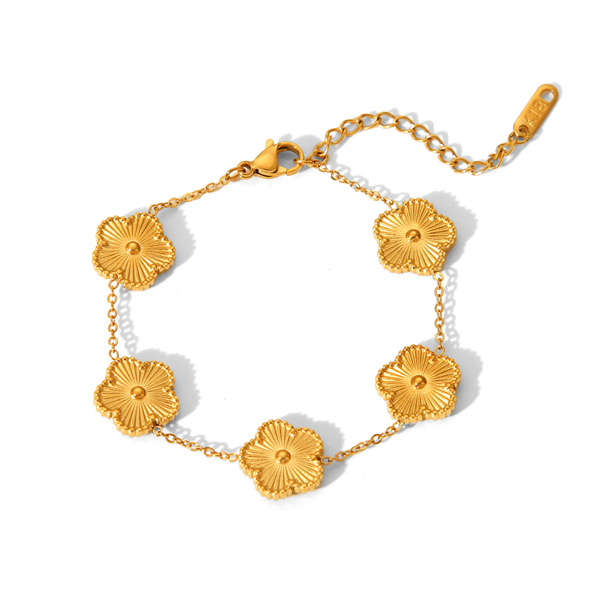 Europa y los Estados Unidos explotaron a través de fronteras, la suerte de cuatro hojas de acero de titanio pulsera dorada doble cara de acero inoxidable de cinco pétalos pulsera de flores joyería
