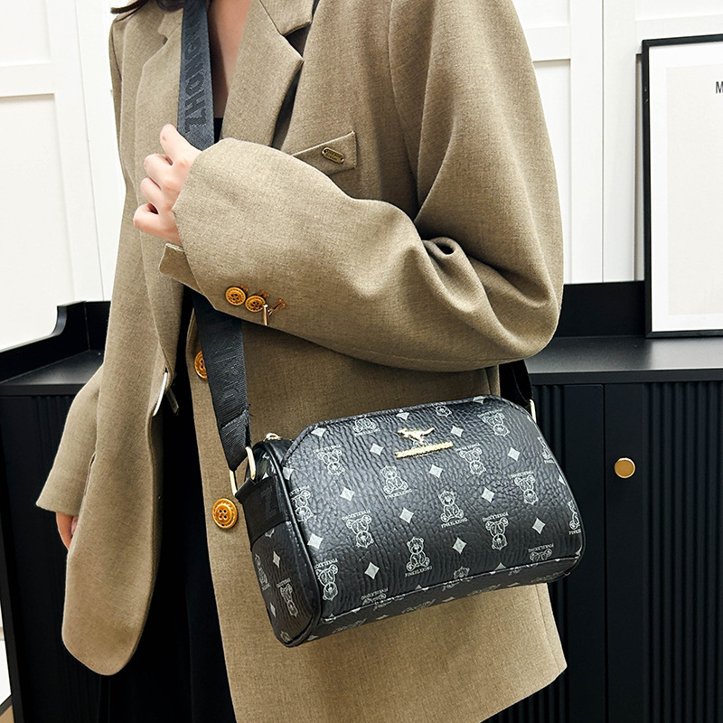 Primavera y otoño nueva moda moda temperamento hombro con bolsos de ocio de dibujos animados fabricantes de bolsos de mujer exportación al por mayor de comercio exterior transfronterizo