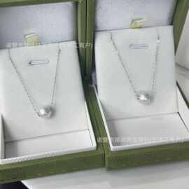天然淡水珍珠9-10mm正圆爱迪生基本无瑕路路通纯银金银双色吊坠