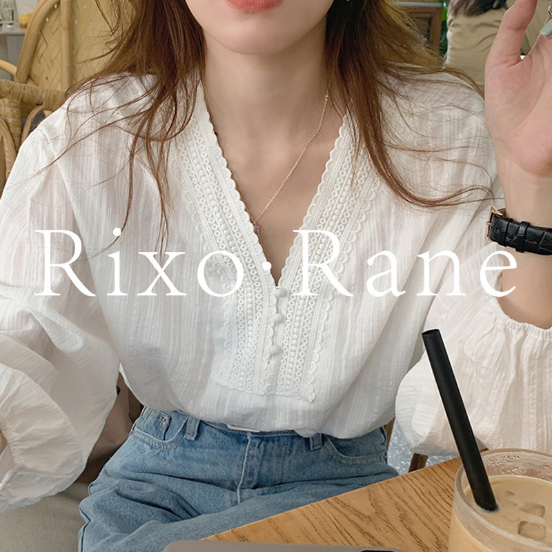 法国Rixo Rane温柔蕾丝花边拼接设计V领包边扣宽松泡泡袖衬衫上衣