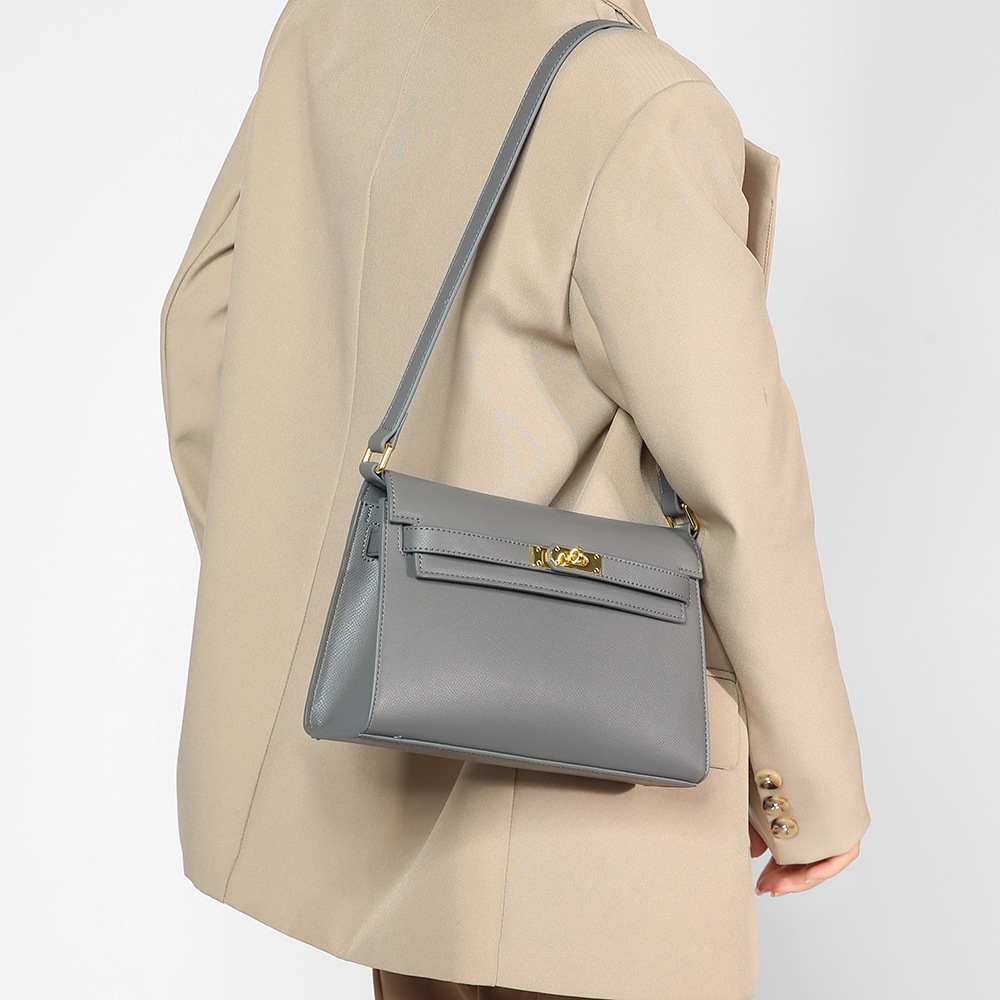 El nuevo bolso Kelly en otoño e invierno de 2024 está lleno de bolsos para mujeres con un solo hombro y axilas, y el diseño de nicho es un bolso de palo de textura avanzada.