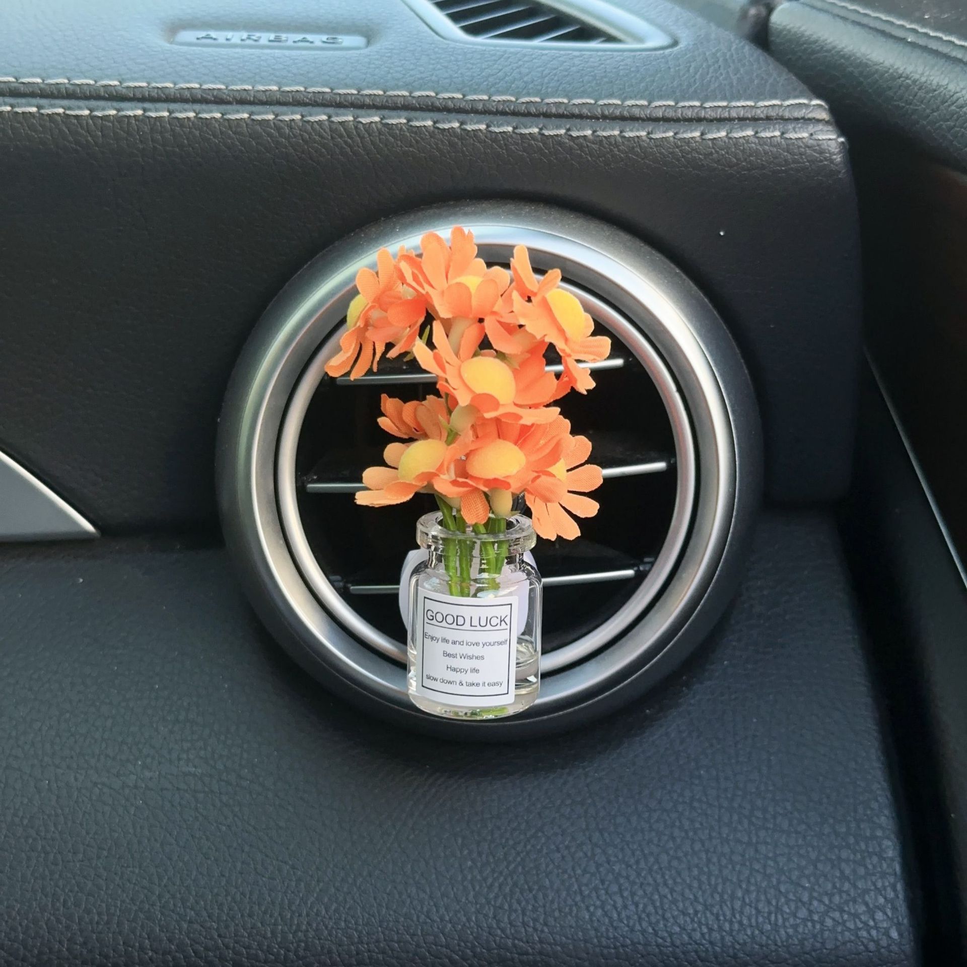 Decoración creativa de salida de aire del automóvil con flores de estrellas pequeñas frescas aire acondicionado botella de perfume de perfumes