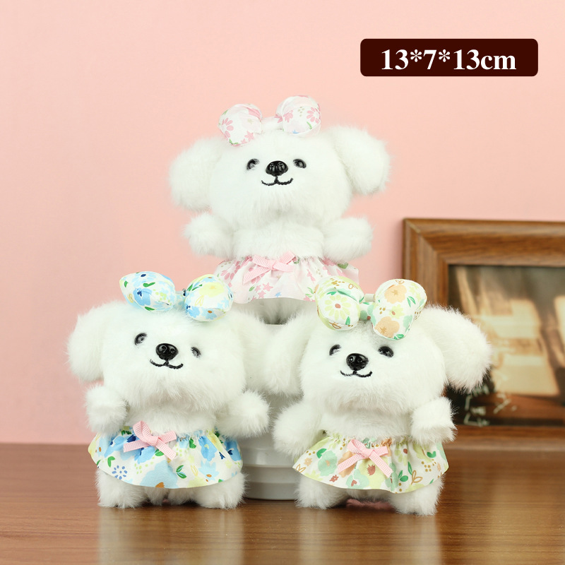 Linda y linda falda floral colgante de perro de juguete de peluche de dibujos animados muñeca de perro bolso de escuela colgante muñeca muñeca pequeña