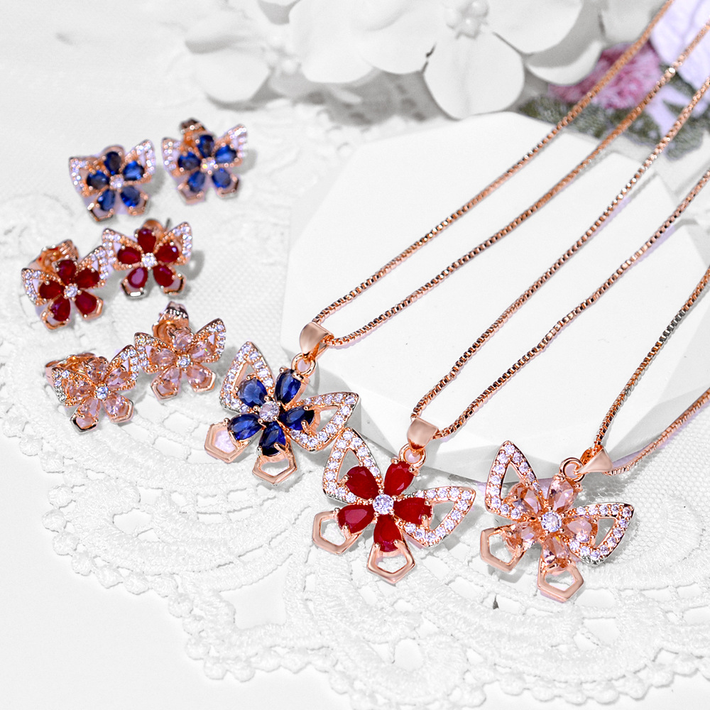 Diseño de mariposa popular transfronteriza europea y americana pendientes de zircon moda collar joyas set pendientes joyas colgantes mujeres