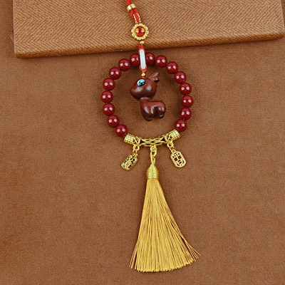 Car hanging Prosperity Zakiram Ornament - blood-sandalwood-deer-seeds-yellow-tassels