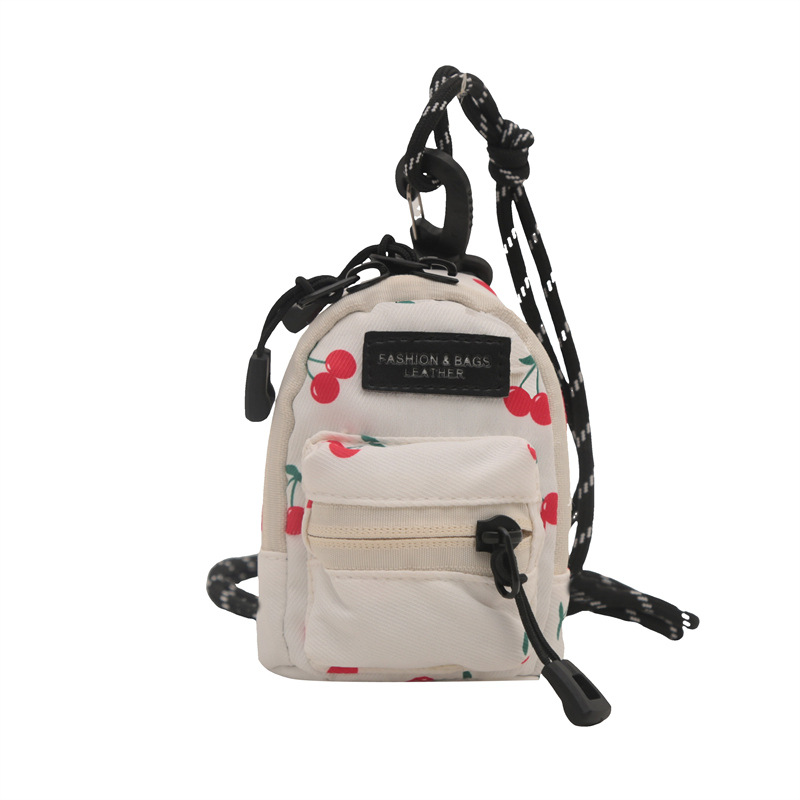 Mini bolso para niños coreano comercio exterior popular leopardo chica mochila de hombro bolso de auriculares de viaje al aire libre bolso de lápiz labial