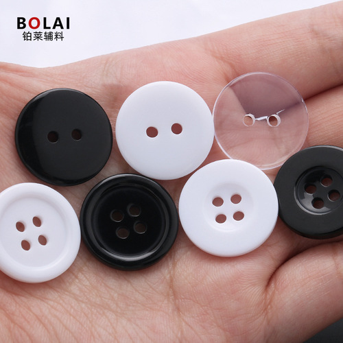 Wholesale resin suit jacket buttons, two-eye wide edge thin edge trench coat coat buttons, black round hand-sewn buttons