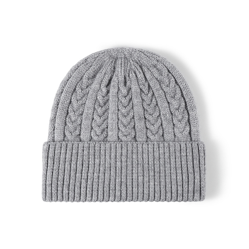 Venta al por mayor de fábrica, cobertura de jacquard de exportación, sombrero de punto con reborde, cálido y grueso, sombrero frío de cachemira de imitación, otoño e invierno, nuevos hombres y mujeres