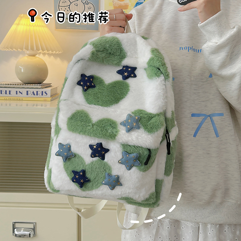 La versión coreana de la mochila de peluche es una mochila de doble hombro, el diseño de nicho japonés de la mochila de alto valor facial, la mochila de clase de las estudiantes universitarias.