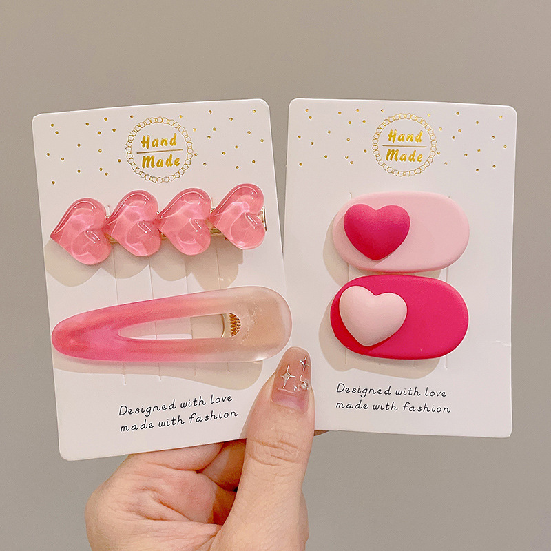 Pin de pelo de verano de dopamina rosa de alto nivel de sensación de frangeo un clip de pelo de frente acabado de pelo de broche adorable adornamiento para el pelo