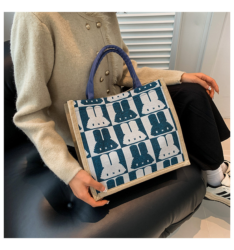 High-end mid-capacity canvas school commuting handbag 2024 new style fashionable and versatile linen single-shoulder tote bag undefined