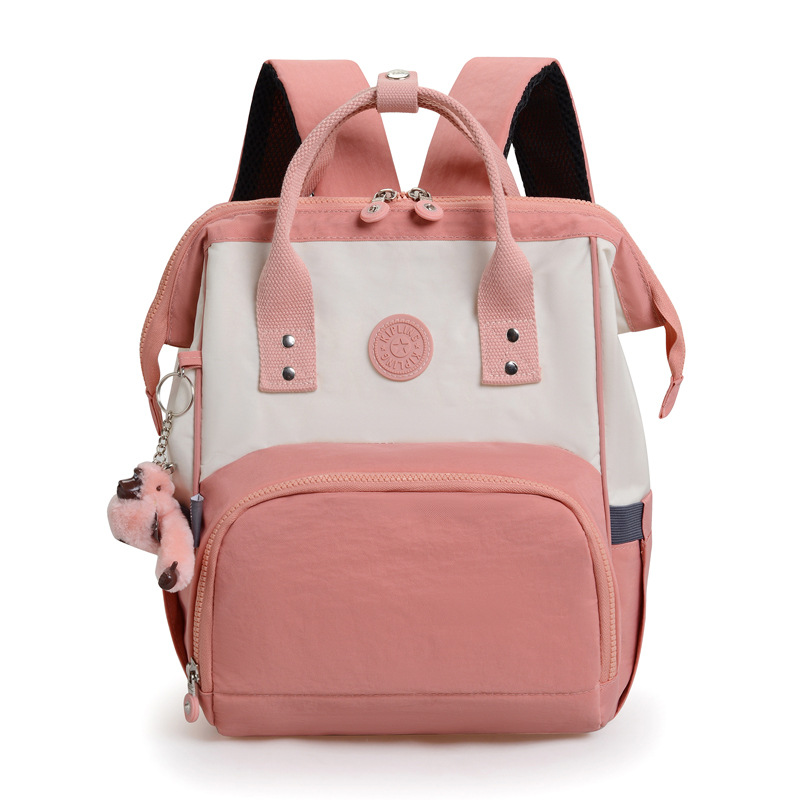 2025 nueva mochila para mujer casual kp momia bolso tela de nailon moda compras mochila con colgante de mono
